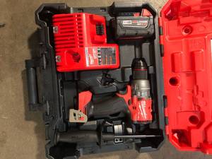lot 9 image: Milwaukee M18 FUEL 18V Lithium-Ion Brushless Cordless 12 in. Hammer Drill Driver Kit with a 1 Battery and Hard Case Customer Returns See Pictures