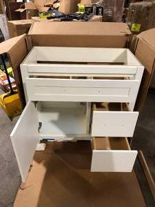 lot 50 image: Home Decorators Collection Clady 37 in. Single Sink White Bath Vanity (Granite Top Not Included)  Customer Returns See Pictures