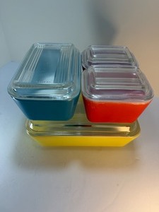 lot 37 image: Vintage PYREX Primary Colors Refrigerator Dish Set (4 Pieces w Lids)  Red, Blue, Yellow