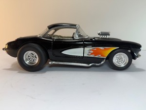 lot 119 image: RARE Road Signature 118 Scale 1957 Chevrolet Corvette Gasser Black Diecast Model Car W Flames