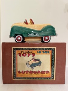 lot 39 image: Vandor Toys in the Cupboard Pedal Car Cookie Jar (NIB 1997)