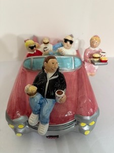 lot 107 image: VINTAGE 1997 Lotus Chubbies 50s Pink Cadillac Diner Carhop Ceramic Cookie Jar