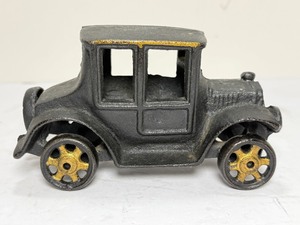 lot 176 image: Vintage Cast Iron Model T Ford Toy Car - Black &amp Gold Sedan