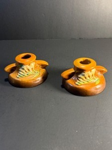 lot 161 image: Vintage Roseville Pottery Freesia Pattern Candlesticks  Shape #1160-2  Brown &amp Green
