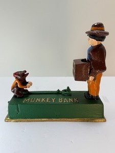 lot 82 image: Vintage Cast Iron Mechanical Monkey Bank Coin Bank