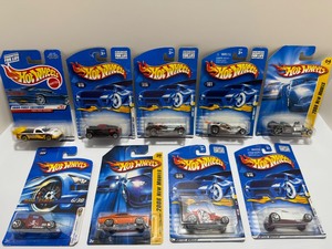 lot 44 image: Hot Wheels Lot of 9 Die-Cast Cars NIP (New In Package) - 1999 First Editions &amp 2006 New Models - Pikes Peak Tacoma, Bone Shaker, Hemi Challenger &amp More