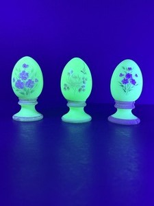 lot 41 image: Set of 3 RARE Vtg FENTON Uranium Custard Satin Glass Hand-Painted Floral Eggs - Glows Bright Green Artist Signed