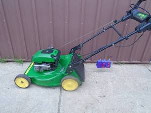 lot 103 image: John Deere self propelled. Used condition. Tested & works. As shown.