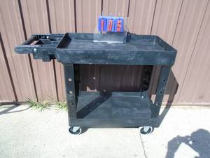 lot 105 image: New 500 lb poly shop cart. As shown.