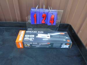 lot 124 image: New woken grease gun. As shown.