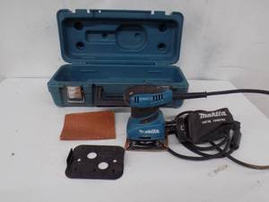 lot 1 image: Makita sander with case. Works