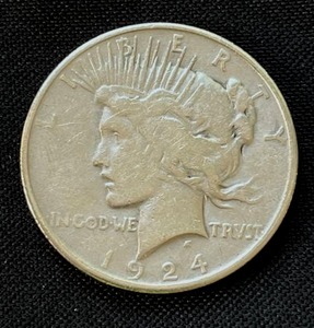 lot 9 image: 1924 Peace Silver Dollar