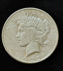 lot 16 image: 1923 Peace Silver Dollar