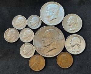 lot 30 image: 90% Silver Coins & More - 1946 Quarter, 1964 Quarter, 1964 Kennedy Half Dollar, Roosevelt Dimes, 1971-D Eisenhower Dollar, 1917 Wheat Penny, and 1953 Wheat Penny