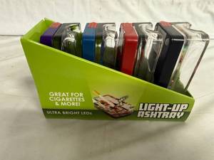 lot 62 image: 4 Glass Light-Up Ash Trays