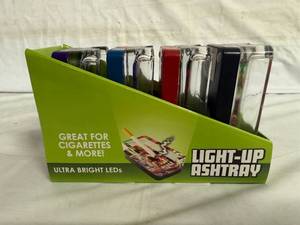 lot 63 image: 4 Glass Light-Up Ash Trays