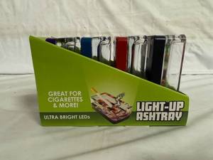 lot 64 image: 4 Glass Light-Up Ash Trays