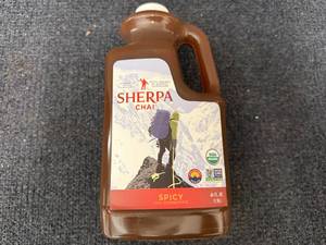 lot 128 image: 64oz Jug of Sherpa Spicy Chai Concentrate