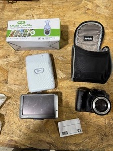 lot 61 image: GARMIN NUVI, SMART WIFI CAMERA, KODAK EASYSHARE Z712, & INSTAX PHOTO PRINTER