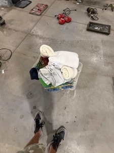lot 79 image: TOTE FULL OF BLANKETS