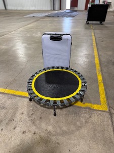 lot 337 image: TRAMPOLINE & HARD SUITCASE