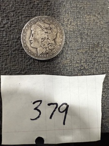 lot 379 image: 1887O  MORGAN SILVER DOLLAR 90%