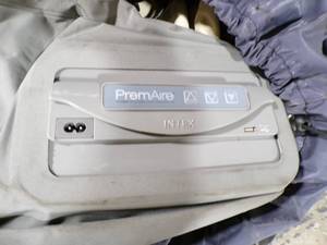 lot 230 image: PREMAIRE SELF INFLATING AIR MATTRESSWITH A EXTRA 110 INTEX AIR PUMP