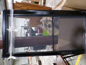 lot 286 image: NEW ANDERSON TOP MOUNT BI FOLD SCREEN DOOR IT LOOKS TO HAVE BEEN INSTALLED BUT NOT USED