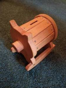 lot 56 image: Wooden Piggy Bank - Full