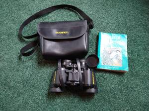 lot 63 image: Bushnell Binoculars & Bird Book