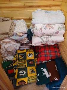 lot 182 image: Miscellaneous Bedding in Closet - Includes Packers & Wild Blankets