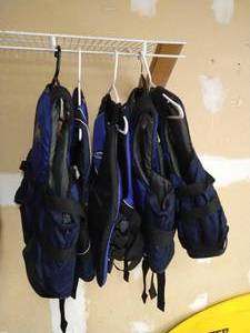 lot 202 image: (5) Nice Stearns Adult Life Vests