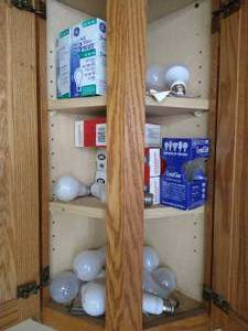 lot 204 image: Corner Cabinet With Light Bulbs
