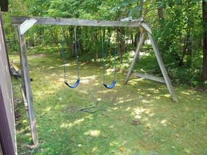 lot 231 image: Wooden Swing Set