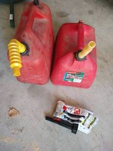 lot 258 image: (2) Full 5-Gallon Gas Cans  Easy Pour Nozzle