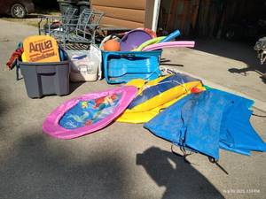 lot 305 image: Large Outdoor Toys Lot - Water Toys, Kids Life Jackets Etc.