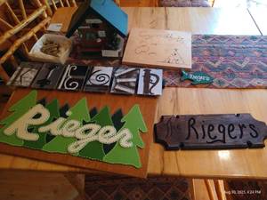 lot 319 image: Several Personalized Rieger Signs, Etc