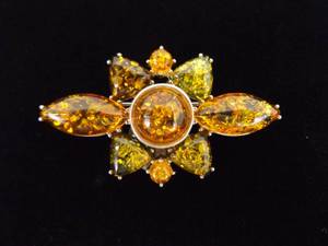 lot 66 image: .925 Sterling Silver Amber Cabochon Bursting Brooch