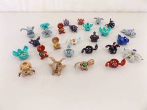 lot 32 image: Lot of 27 Vintage Bakugan Battle Bots