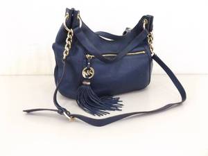 lot 82 image: Authentic Michael Kors Navy Pebble Leather Tassel Crossbody BagPurse