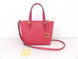 lot 81 image: New with Tags Michael Kors Electric Pink Jet Set Travel Small Top Zip ToteBag