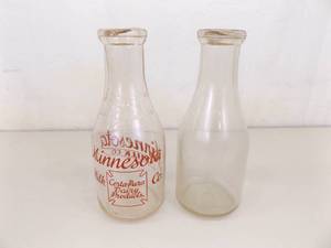 lot 93 image: Lot of 2 Vintage, VERY collectible One Quart Milk Jugs