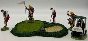 lot 22 image: Department 56 Snow Village First Round of the Year Golf Ceramic Accessories Set