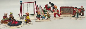 lot 44 image: Department 56 Snow Village Winter Play Ceramic Accessories