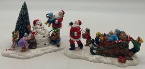 lot 45 image: Department 56 Snow Village Santa Comes to Town 1996 and 1998 Ceramic Figurines