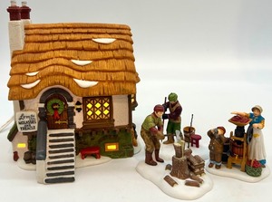 lot 81 image: Department 56 Heritage Dickens Village Lomas Ltd. Molasses Building with Figures