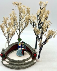 lot 86 image: Department 56 Village Winter Trees and Skating Couple Figurines