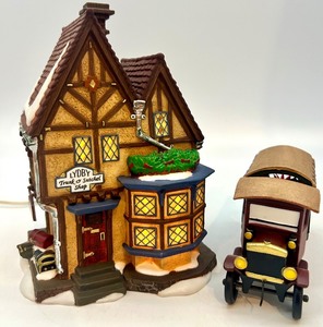 lot 88 image: Christmas Village Lighted Lydbury Trunk Shop with Vintage Delivery Truck