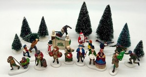 lot 99 image: Heritage Village Collection Christmas Village Figures and Trees Set