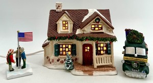 lot 124 image: Christmas Holiday Village Lot Lighted House, Flick on Flagpole Figurine, and Marshall Fields Delivery Truck